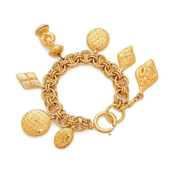 CHANEL Jewelry - CHANEL 7 Charms Gold Plated Bracelet Timeless